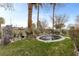 Backyard shows spa surrounded by desert flora and stone features at 2822 Soft Horizon Way, Las Vegas, NV 89135