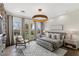 Well-lit bedroom with patio access and modern decor at 2822 Soft Horizon Way, Las Vegas, NV 89135