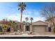 Charming single-story home with stone accents, desert landscaping, and a two-car garage at 2822 Soft Horizon Way, Las Vegas, NV 89135
