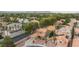 Lovely Las Vegas neighborhood featuring tile roofs, mature landscaping, and beautiful homes at 9836 Russett Wood Cir, Las Vegas, NV 89117