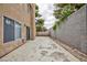 Backyard featuring stucco wall and concrete surface at 9836 Russett Wood Cir, Las Vegas, NV 89117