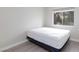 A well-lit bedroom with a large window and a clean modern look at 9836 Russett Wood Cir, Las Vegas, NV 89117