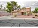 Charming two-story home with a well-manicured front yard and a two-car garage at 9836 Russett Wood Cir, Las Vegas, NV 89117