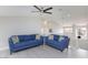 Stylish living room features bright light and comfortable seating at 9836 Russett Wood Cir, Las Vegas, NV 89117