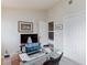 The bright office features a glass top desk with ample room for a laptop at 9836 Russett Wood Cir, Las Vegas, NV 89117