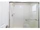 Shower stall features white subway tiles and glass doors at 9836 Russett Wood Cir, Las Vegas, NV 89117