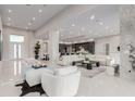 Bright and airy living room with tile flooring, modern furnishings, and open floor plan at 7062 Maverick St, Las Vegas, NV 89131