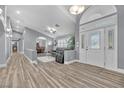 Grand foyer with high ceilings, beautiful floors and elegant entrance doors filling the space with natural light at 8275 W Craig Rd, Las Vegas, NV 89129