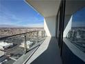 Wide balcony with glass railings offering panoramic city views at 4381 W Flamingo Rd # 1905, Las Vegas, NV 89103