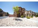 Charming two-story home with well-kept landscaping in a residential neighborhood at 5713 Heineken Dr, North Las Vegas, NV 89031