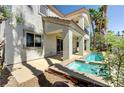 Relaxing pool and spa area, lush landscaping at 52 Cascade Lake St, Las Vegas, NV 89148