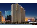 Captivating nighttime shot of the MGM Signature towers, highlighting their architectural design at 135 E Harmon Ave # 1020, Las Vegas, NV 89109