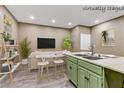 This living room offers modern furniture, and large windows to create a comfortable space at 5655 E Sahara Ave # 1052, Las Vegas, NV 89142