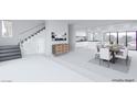 Open concept dining room and kitchen with modern finishes at 7090 Fazio Dr, Las Vegas, NV 89110