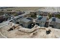 New home construction site featuring multiple homes with solar panels on the roof being developed at 6527 Adrian Ridge Ct, Las Vegas, NV 89149