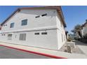 Side view of building showcasing building design and landscaping at 1321 Del Mar St # 4, Las Vegas, NV 89119