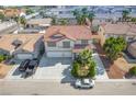 Aerial view of a two-story house with a large yard and neighborhood at 7917 Sally Irene Ct, Las Vegas, NV 89113