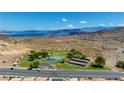 Community features tennis courts, playground, and lake views at 687 Marina Dr # 39, Boulder City, NV 89005