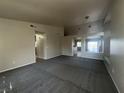 Bright living room featuring tile flooring and an open floor plan at 9804 Panorama Cliff Dr, Las Vegas, NV 89134