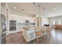 Spacious kitchen with island, stainless steel appliances, and granite countertops at 4775 E Beacon Ridge Dr, Pahrump, NV 89061