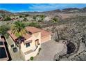 Luxury home with mountain views and a beautiful yard at 1150 Calcione Dr, Henderson, NV 89011