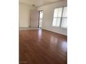 Living room with hardwood floors and lots of natural light at 6449 Elizabethtown Ave, Las Vegas, NV 89110