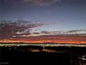 Nighttime view of the city skyline and surrounding mountains at 270 Besame Ct, Las Vegas, NV 89138