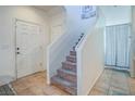 Bright entryway with staircase and tiled flooring at 4590 Lime Straight Dr, Las Vegas, NV 89115