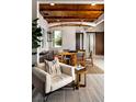 Rustic dining area with wooden table and unique ceiling feature at 9003 Shifting Skye St, Las Vegas, NV 89166