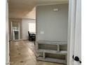 View of the entryway, showing a built-in shelf and view into the dining area at 5900 Gordon Ave, Las Vegas, NV 89108