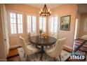 Charming dining room with a round table and four chairs at 9408 Forest Edge Ave, Las Vegas, NV 89149