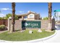Attractive community entrance sign, enhanced by lush landscaping and mature palm trees at 1050 E Cactus Ave # 2104, Las Vegas, NV 89183