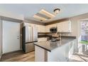 Modern kitchen with stainless steel appliances and an island at 8209 Crows Nest Ln, Las Vegas, NV 89128