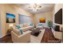 Comfortable living room features stylish furniture, modern art, and natural light at 1200 Golf Club Dr, Laughlin, NV 89029