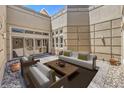 Inviting outdoor patio with a comfortable seating area perfect for relaxing and entertaining at 2017 Slow Wind St, Las Vegas, NV 89134
