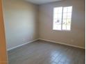 Bright bedroom with neutral walls and tile flooring at 4761 E Sandalwood Dr, Pahrump, NV 89061