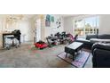 Living room with black couch and coffee table at 2300 E Silverado Ranch Blvd # 1165, Las Vegas, NV 89183