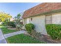 Inviting entrance to the home with well-maintained landscaping at 3594 Villa Knolls East Dr, Las Vegas, NV 89120