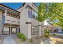 Well-maintained apartment building featuring multiple units and lush landscaping at 7255 W Sunset Rd # 1140, Las Vegas, NV 89113