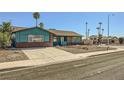 View of a quaint single-story home with low maintenance desert landscaping in the front yard at 425 Oil Lantern Ln, Las Vegas, NV 89145