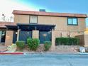 Charming two-story townhome with brick accents at 310 Brookside Ln # B, Las Vegas, NV 89107