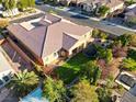 Single-story home with a large backyard, including a trampoline and spa at 6423 Fosco Ct, Las Vegas, NV 89131