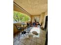 Cozy outdoor balcony furnished with seating, offering a relaxing space at 8721 Red Brook Dr # 203, Las Vegas, NV 89128