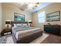 Comfortable bedroom with a plush rug, a decorative dresser, and serene wall art at 2664 Chinaberry Hill St, Laughlin, NV 89029