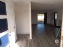 Spacious entryway with wood-look floors and view to living area at 417 Antelope Way, Las Vegas, NV 89145