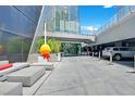 Modern building entrance with seating, landscaping, and stylish design elements at 3726 Las Vegas Blvd # 1902, Las Vegas, NV 89158