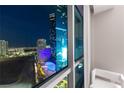 Stunning high-rise view showcases the vibrant city lights at night at 2700 Las Vegas Blvd # 2303, Las Vegas, NV 89109