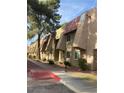 Exterior view of a building showing its facade and a sidewalk at 5317 Indian River Dr # 295, Las Vegas, NV 89103