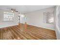 Living room with hardwood floors and ceiling fan at 2130 Sealion Dr # 207, Las Vegas, NV 89128