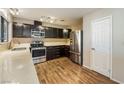 Modern kitchen with stainless steel appliances and light countertops at 2360 Greyhound St, Pahrump, NV 89060